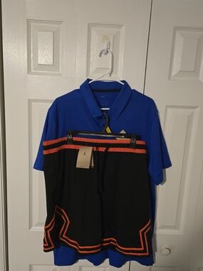 Nike Blue Polo with Black & Orange Jordan Shorts